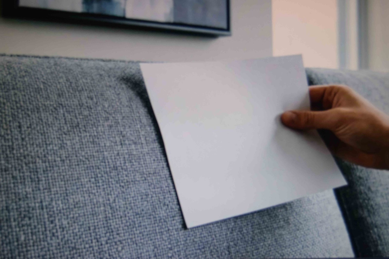 White paper held against grey upholstery to reveal its undertone